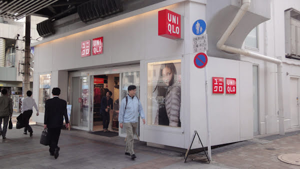 a small uniqlo store just outside the market